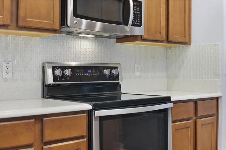 Kitchen has stainless steel appliances