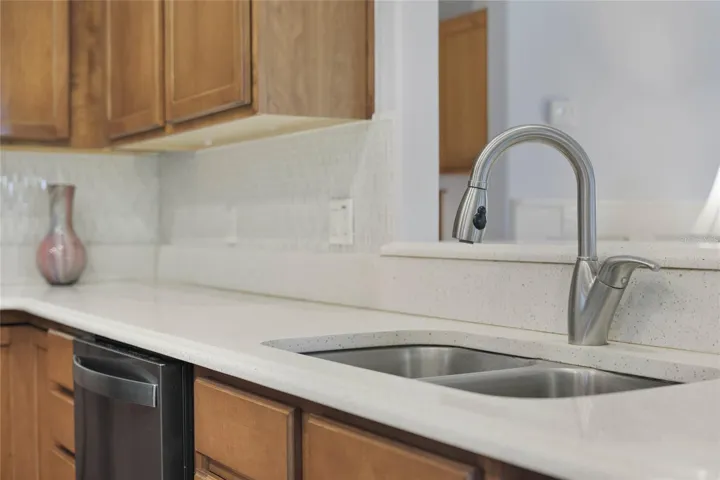 Kitchen has gorgeous new Quartz and tile backsplash