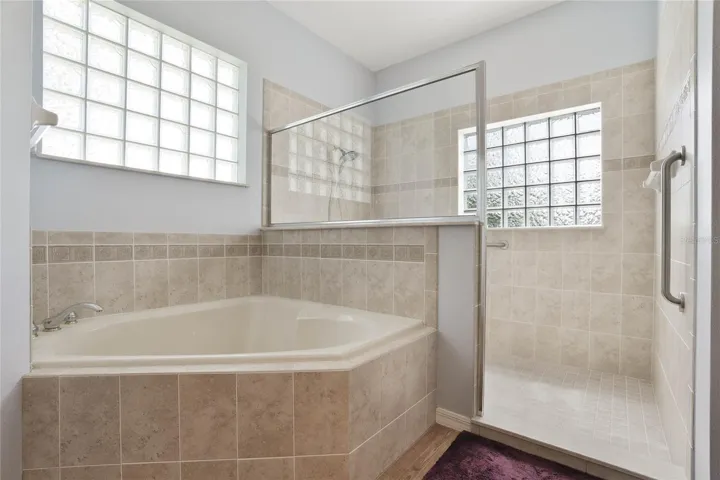 Primary Bathroom with large walk in shower and garden tub