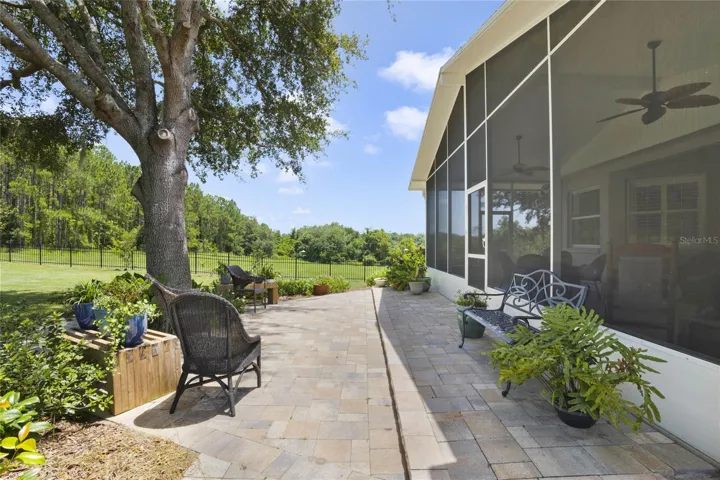Enjoy outside paver walkway and additional seating area