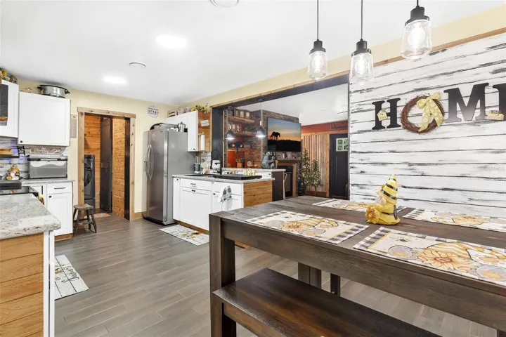 Dining Area overlooking Kitchen and Living Area