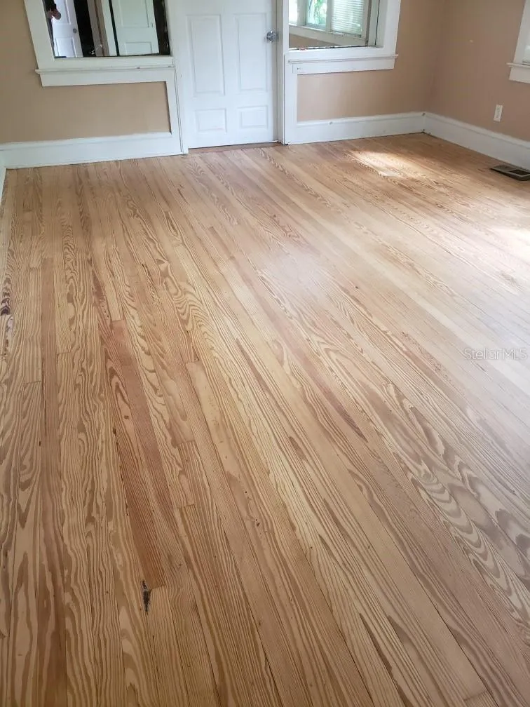 3.1.2025 refurbished floors downstairs. (Primary BR)