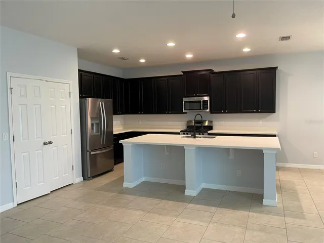 Kitchen with stainless steel appliances.
