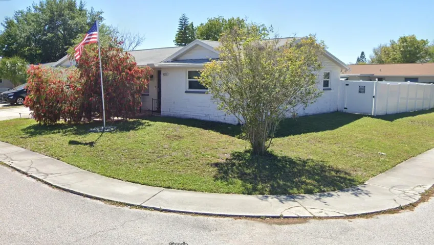 Extra large corner lot with 167' of new PVC fencing!