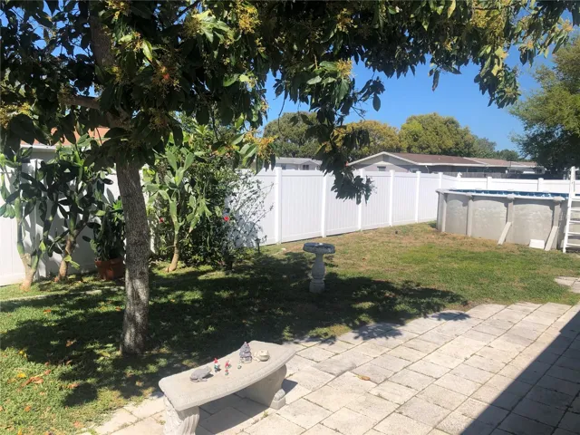beautiful large private yard with 167 feet of new PVC fencing