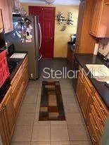 Red Door leads to interior Laundry Room