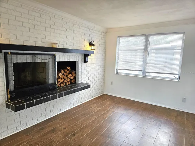 Family room with wood-burning fireplace