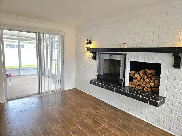 Family Room with Fireplace and sliders out to lanai