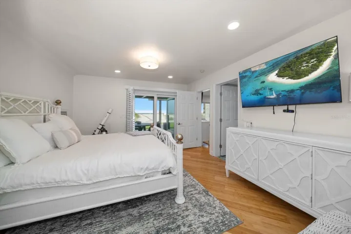 2nd bedroom in Main home with sliders to Beach patio