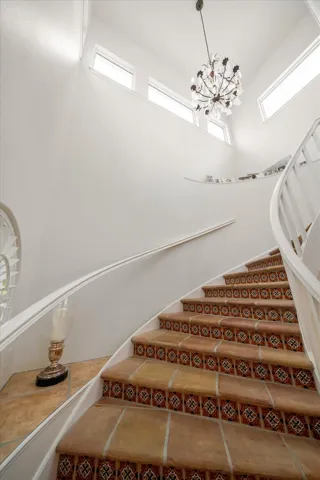 Stone staircase to Primary suite