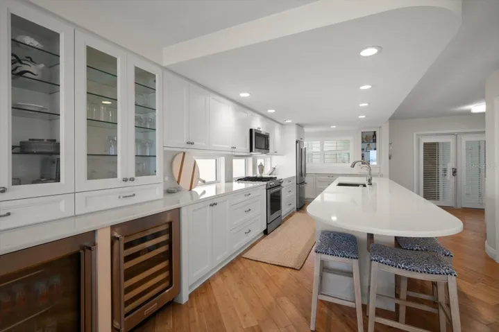 Look at this kitchen space, wine cooler and beer/soda frig!