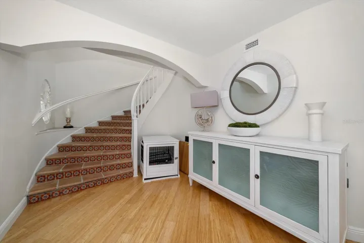 Entry foyer and staircase to upper level