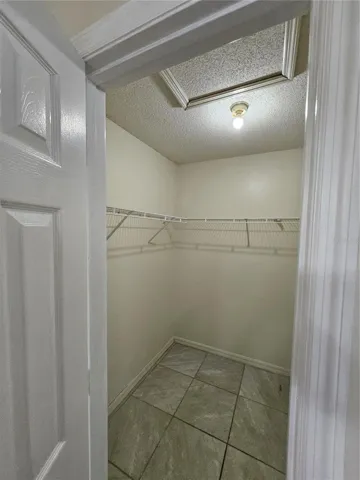 Walk in closet Primary bedroom.
