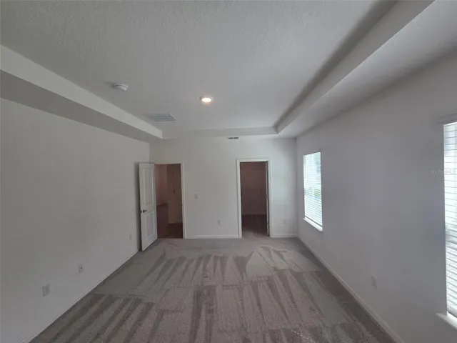 Primary Bedroom with tray ceiling