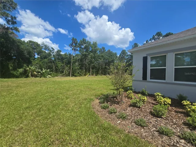 Spacious lot with beautiful landscaping