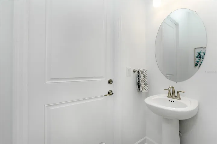 Guest bedroom ensuite 12 bath. WIth Access to the backyard and perfect for a pool bath.