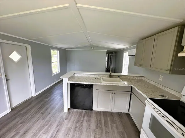 The home has been updated with laminate flooring throughout.