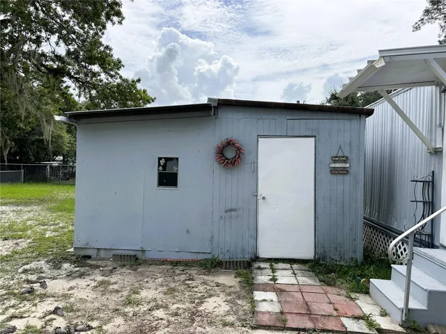 When you step out the back door, you'll find the first of two large storage areas.