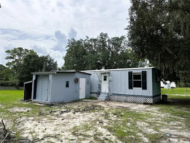 There is also a small, covered space on the side of the shed for yard tools.