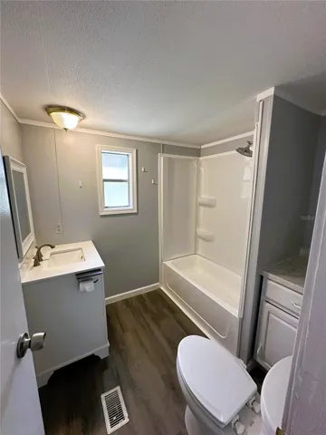 The bathroom was recently updated with a brand new shower kit.