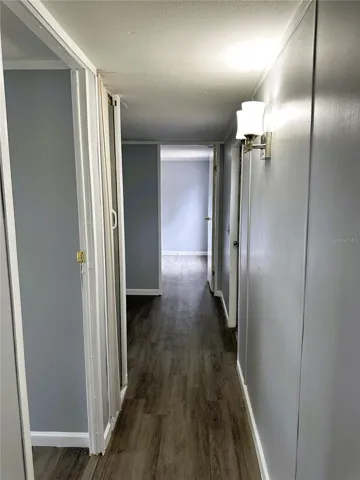 Hall leading from the kitchen/living area to the bedrooms.