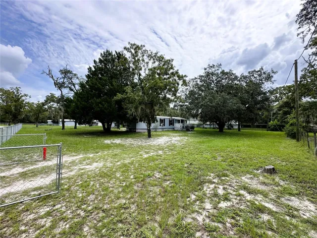 With a half-acre of fully fenced yard, there is plenty of space to play and entertain, while enjoying time away from the hustle and bustle.