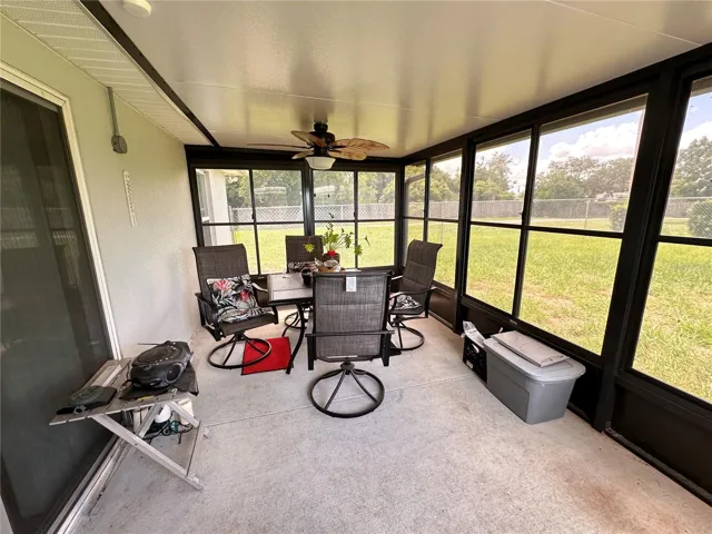 ENCLOSED LANAI WITH SCREENS AND WINDOWS