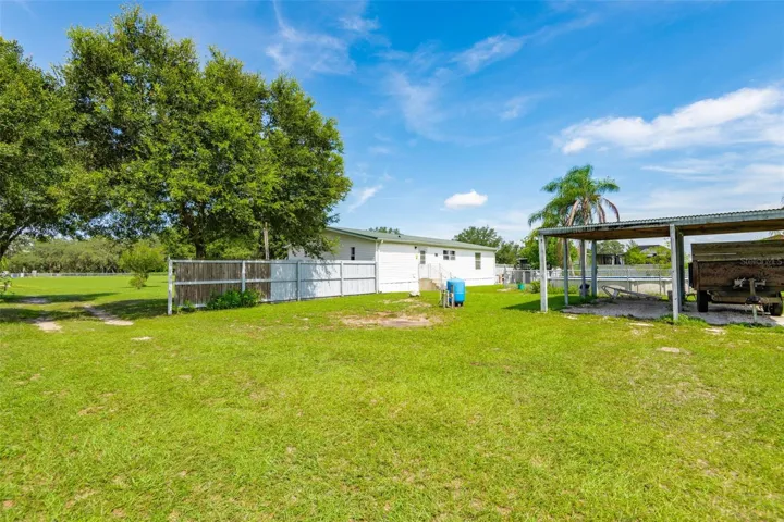 back yard with carport