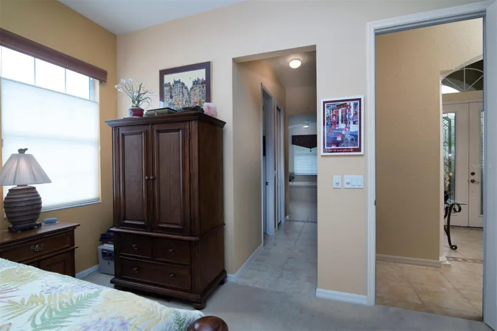 The hallway that connects the master bedroom to the master bath holds the 2 walk-in closets.