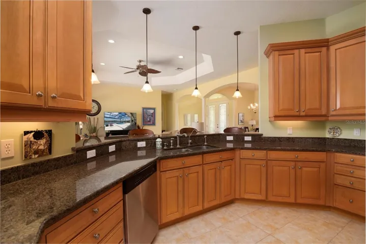 The kitchen has upgraded appliances and plumbing fixtures. Banks of drawers is a plus.