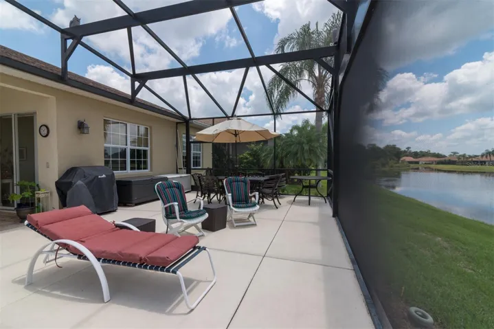 The oversized birdcage allows for greater enjoyment of the pool area.