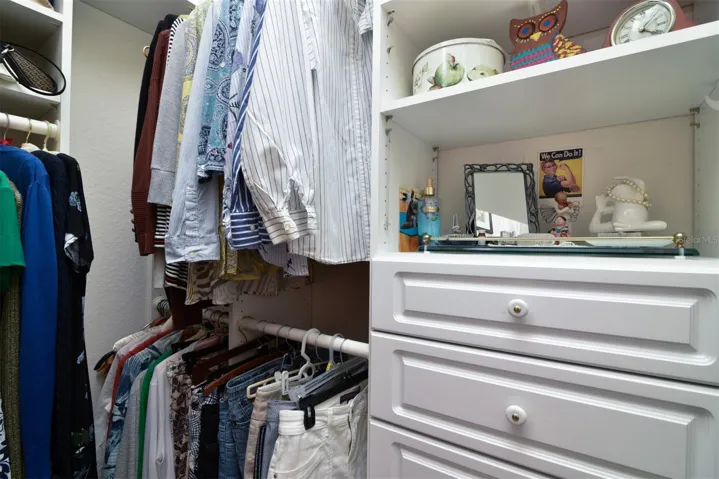 The high quality of the walk-in closet's built-in cabintry is a major plus!