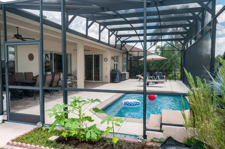 The huge birdcage over the pool area greatly increases the usability of this area.