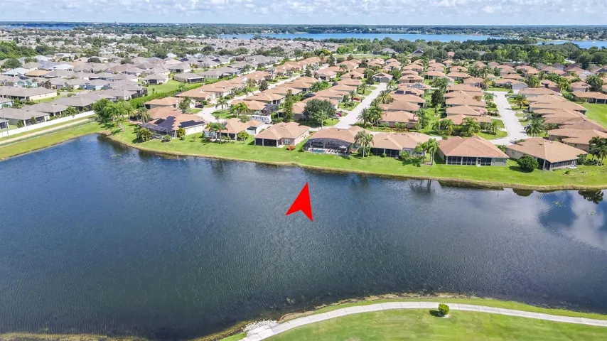 The pond behind this home not only adds privacy but also place where 