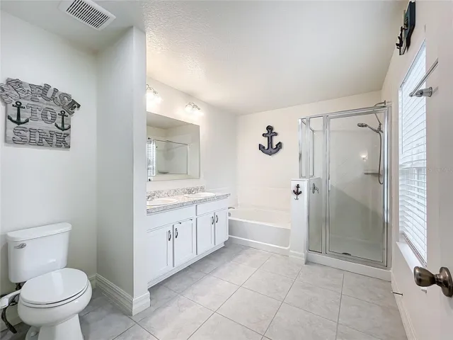 Large Primary Bathroom with Tub and Separate Shower