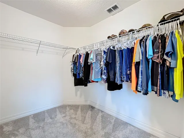 Walk In Closet in Primary Bedroom