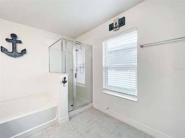 Large Primary Bathroom with Tub and Separate Shower