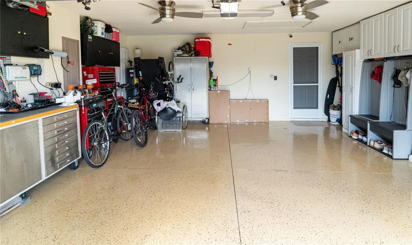 2-car garage with storage cabinets