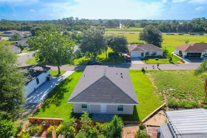 Aerial of the home and the backyard