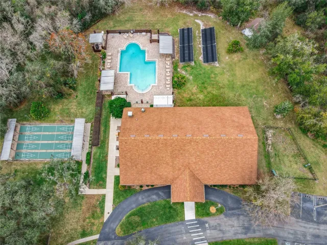 Clubhouse, community pool and shuffleboard