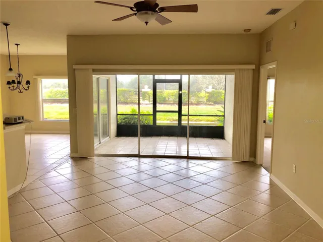 Living Room with sliding glass doors to screened lanai