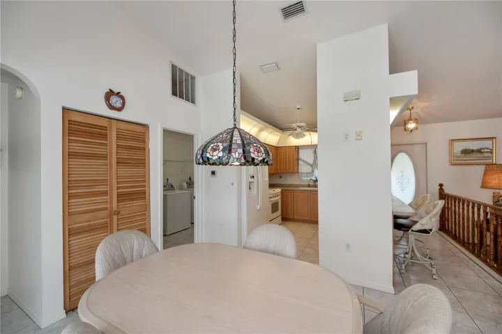 practical floor plan design with a large pantry closet, laundry room off of the kitchen that opens to the garage and openness for memories to be made
