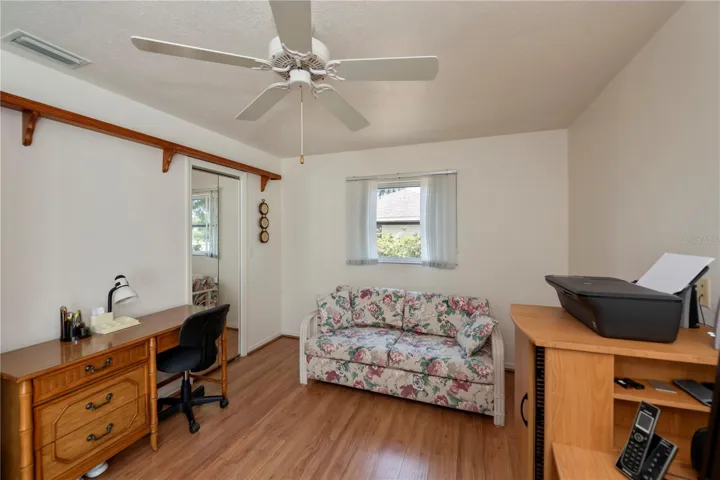 One of two auxiliary bedrooms used & shown as an office.