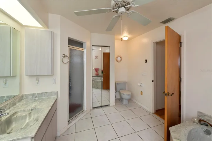 This primary ensuite bath has it all!