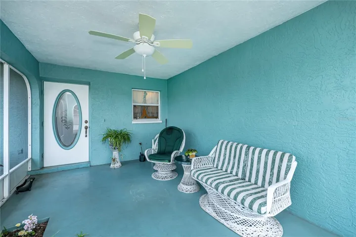 Savor your morning cup of coffee or afternoon tall glass of iced tea, relaxing on this expansive front porch while listening to the birds sing.