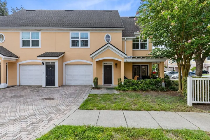 Stylish, second floor walk-up with private main floor garage.