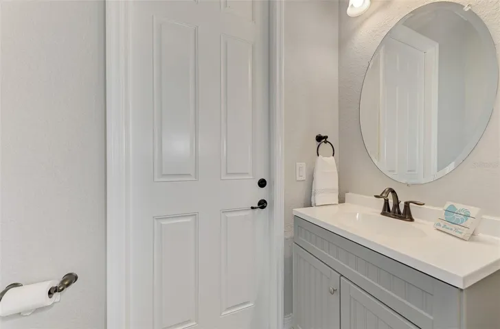 Pool half bath, connects to Bedroom 3