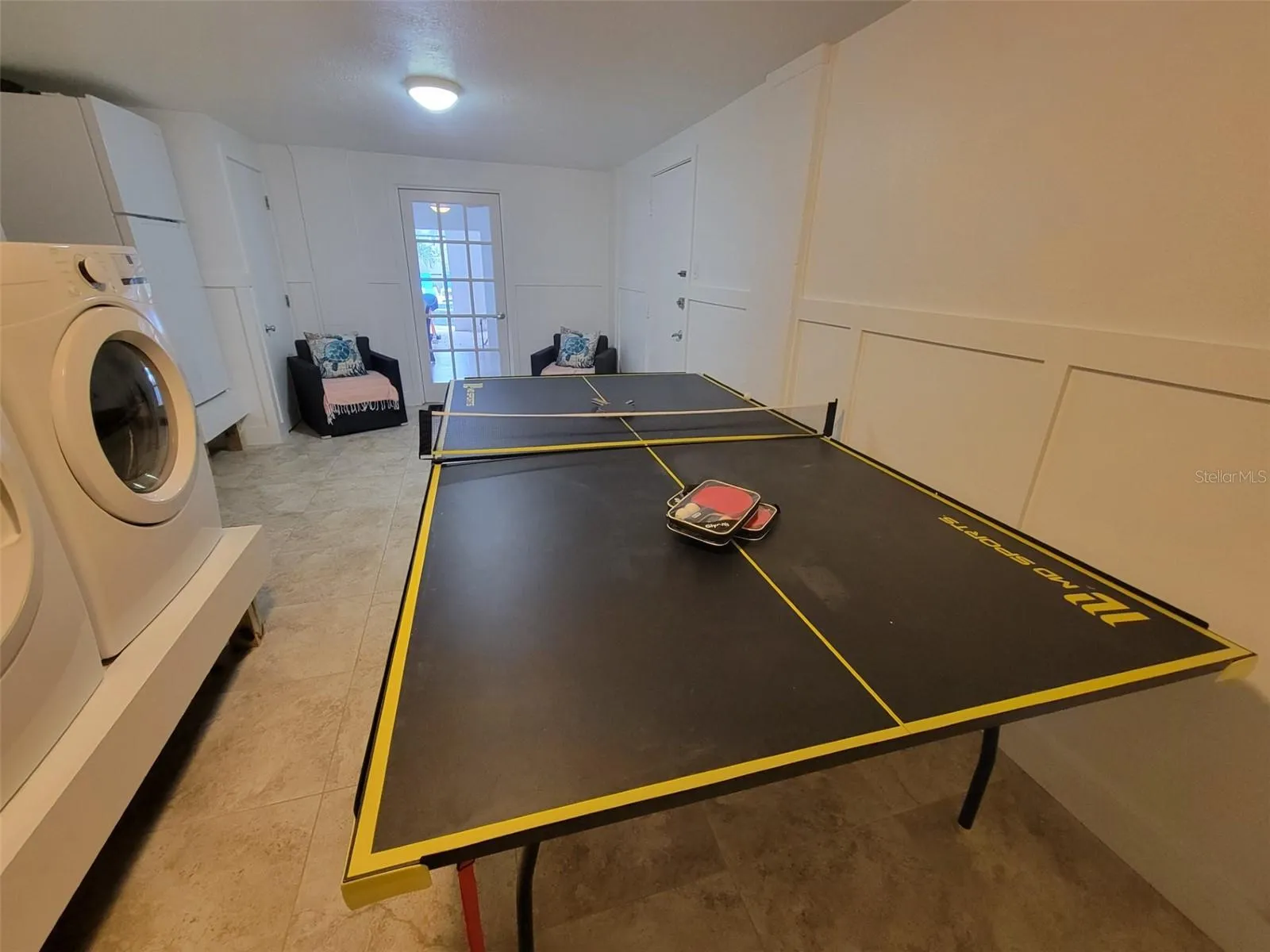 Ping Pong table/washer, dryer, extra fridge.  Access to pool area