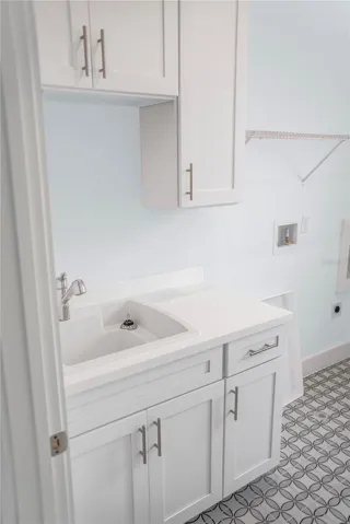 Laundry rm cabinetry and sink