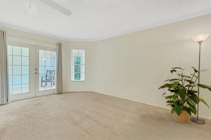 Master suite has French doors that open to the bonus sunroom~